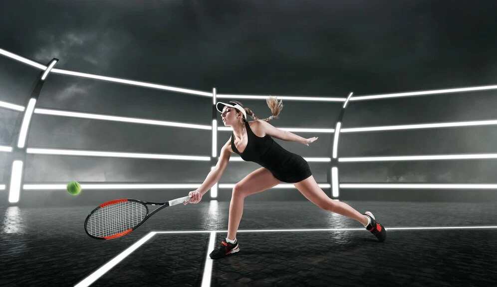 female tennis player bending over mid shot during match